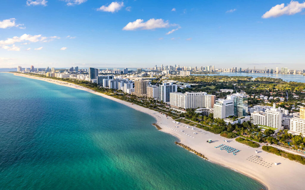 Vibrant Miami Beach Aerial View: Turquoise Waters & Sandy Shores Wallpaper