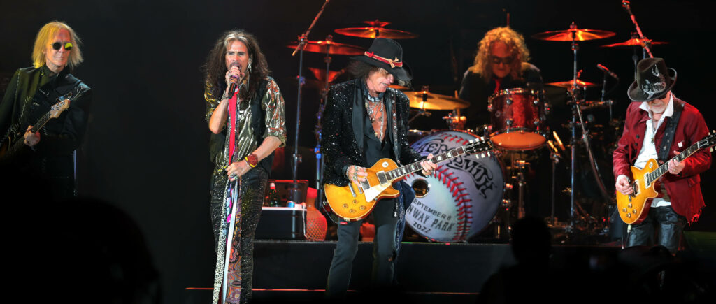 Vibrant Aerosmith Live Concert Wallpaper: Energy & Iconic Stage Scene