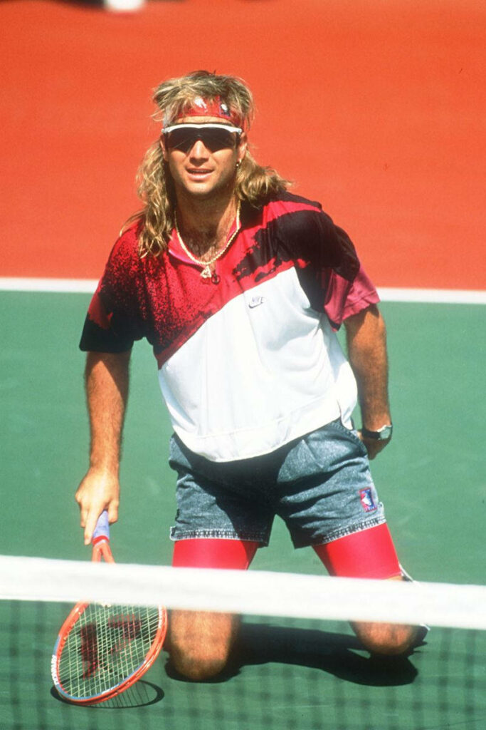Andre Agassi Tennis Wallpaper: Iconic Style on Court with Racket