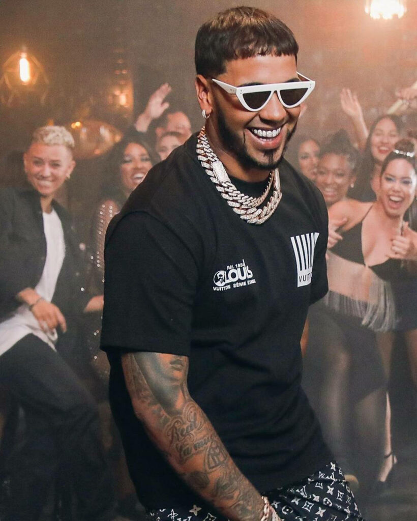 Vibrant Anuel AA Wallpaper: Rapper with Sunglasses & Party Vibes