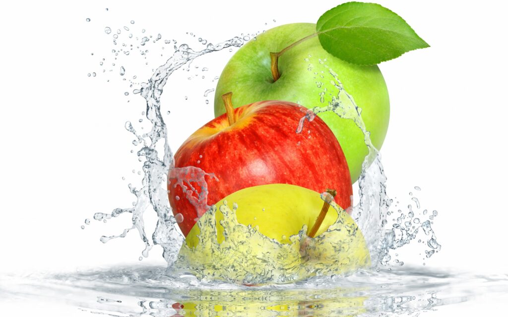 Fresh Red & Green Apples Splashing in Water - Lively Wallpaper Background