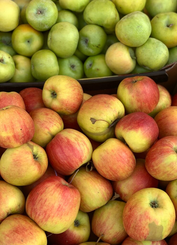 Vibrant Apple Wallpaper: Colorful Red, Yellow & Green Background