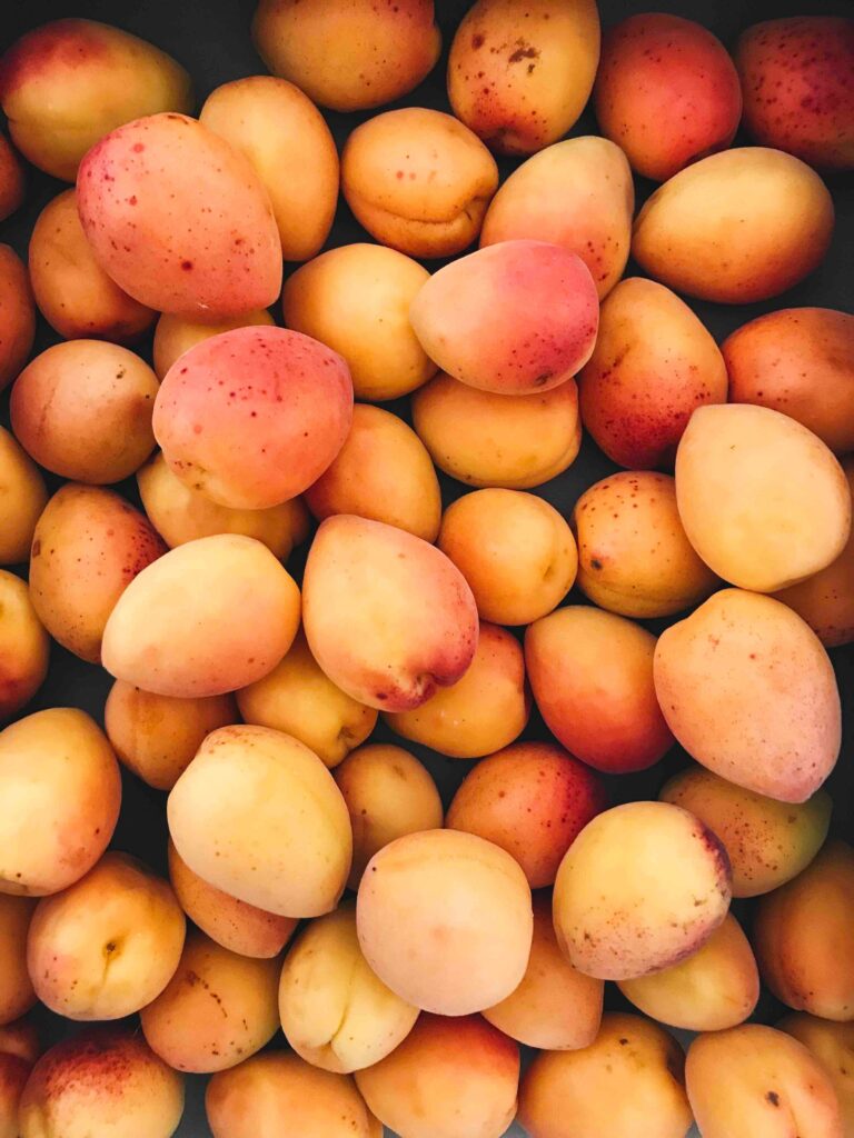 Vibrant Apricot Wallpaper: Fresh Harvest in Orange & Reddish Hues
