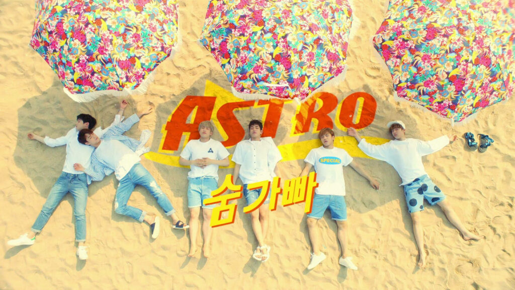 Astro K-Pop Wallpaper: Vibrant Beach Scene with Members Relaxing
