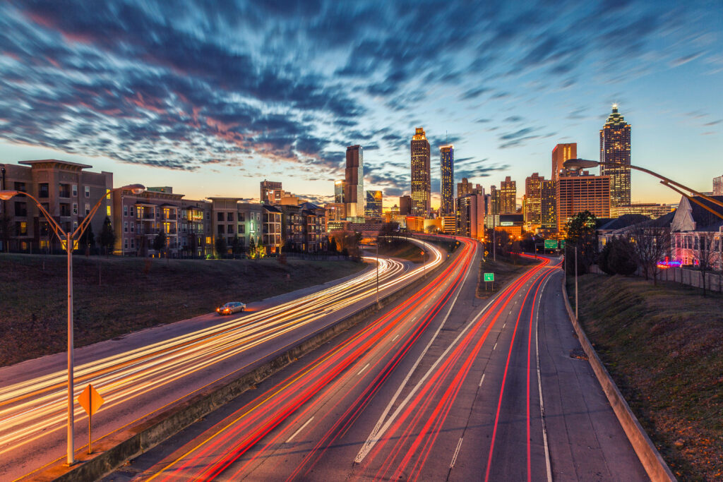 Vibrant Atlanta Skyline Wallpaper: Evening Sky & Light Trails