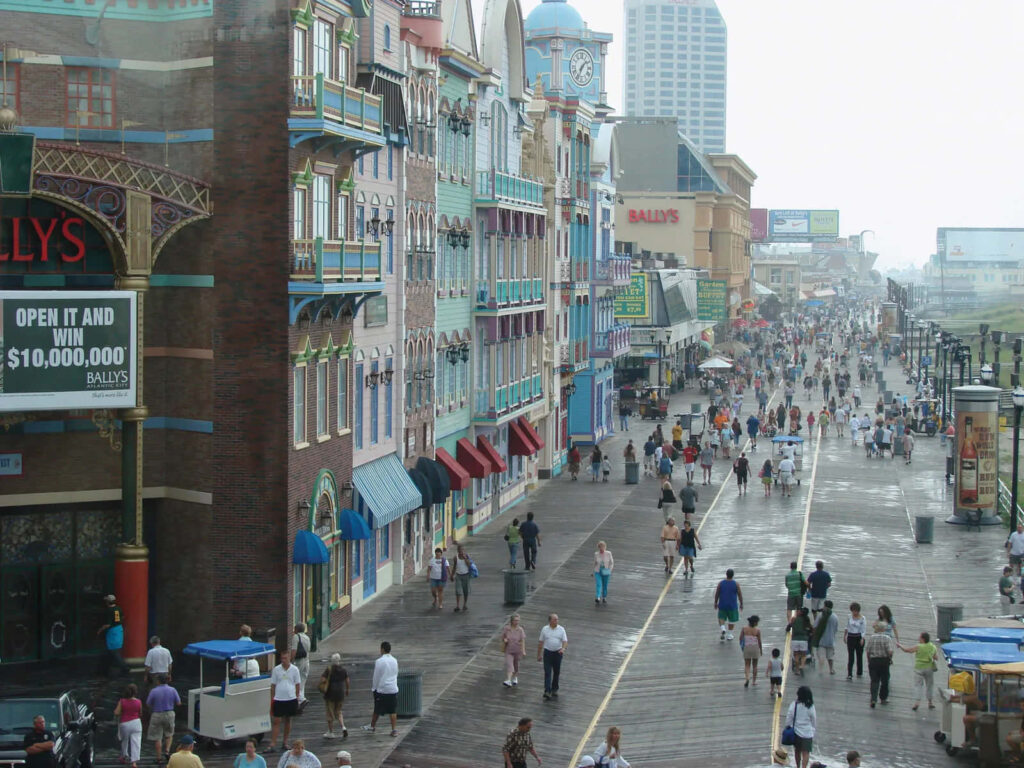 Vibrant Atlantic City Boardwalk Wallpaper Background with Colorful Scenes