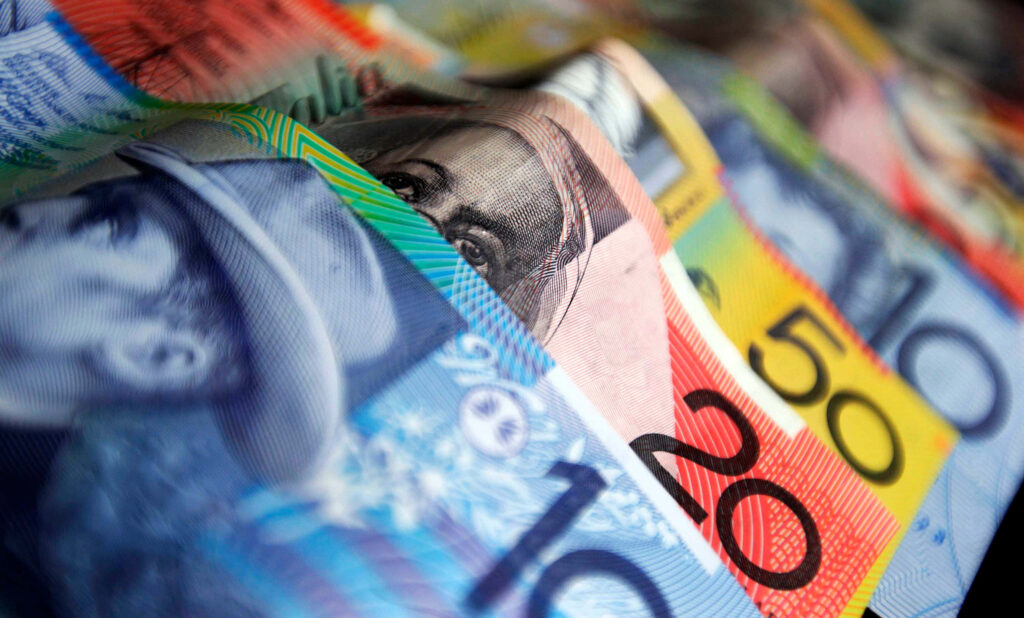 Close-up of vibrant Australian dollar banknotes showing colorful design and security features Wallpaper