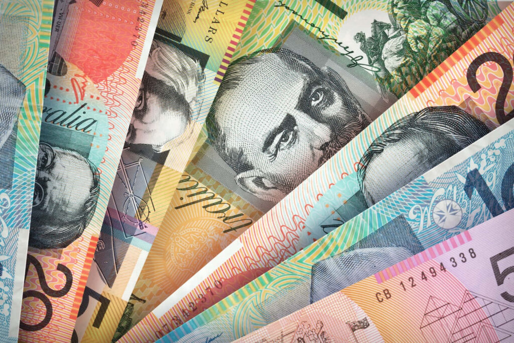 Close up of colorful Australian dollar banknotes vibrant detailed currency wallpaper background