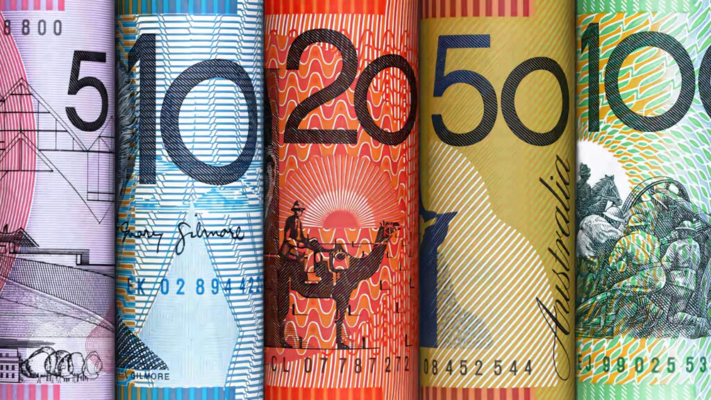 Close-up of vibrant Australian Dollar banknotes showing colorful designs and security features Wallpaper