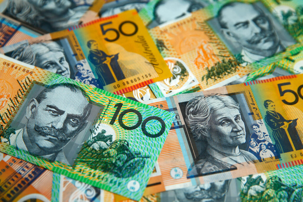 Close-up of colorful Australian dollar banknotes with detailed portraits vibrant currency wallpaper