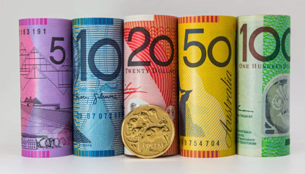 Colorful Australian Dollar banknotes and gold coin with intricate designs vibrant wallpaper background