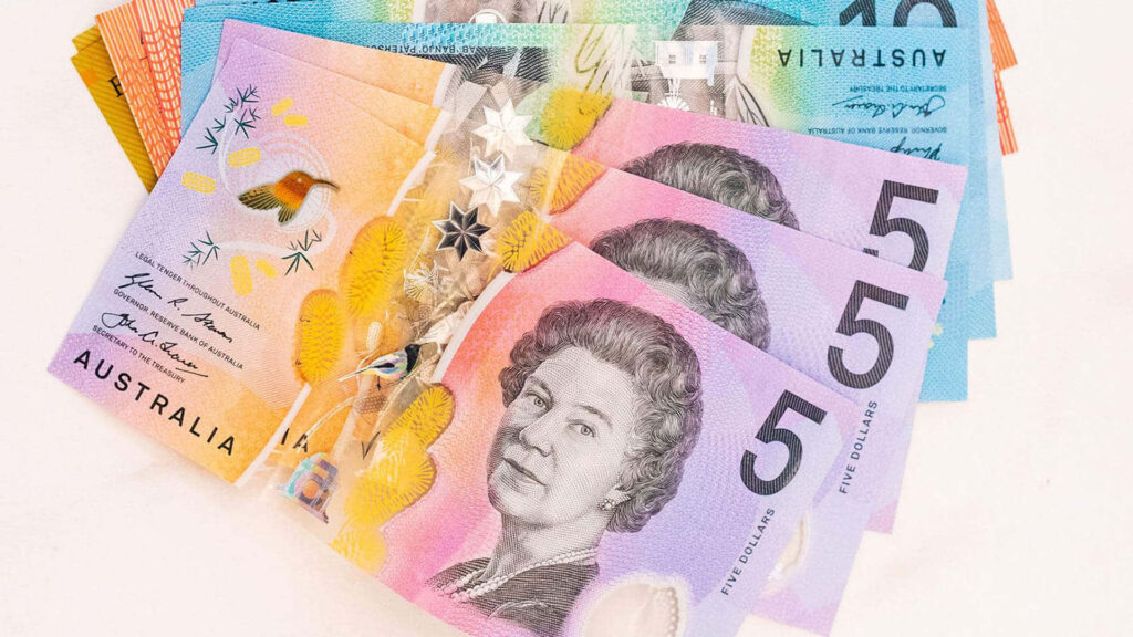 Vibrant Australian five dollar banknote with intricate designs and security features wallpaper background