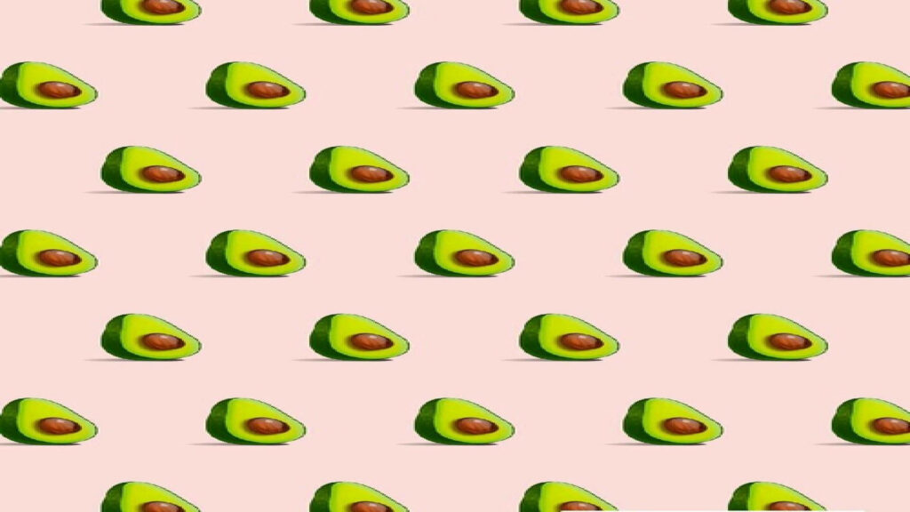 Vibrant Avocado Minimalist Wallpaper on Soft Pastel Pink Background