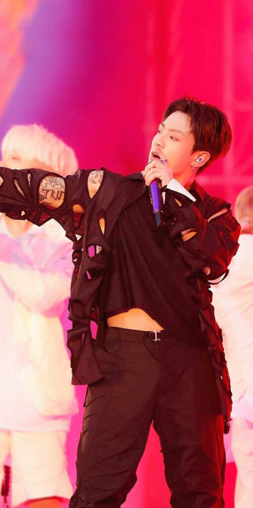 Vibrant BTS Jungkook Wallpaper: Charismatic Performance & Tattoos