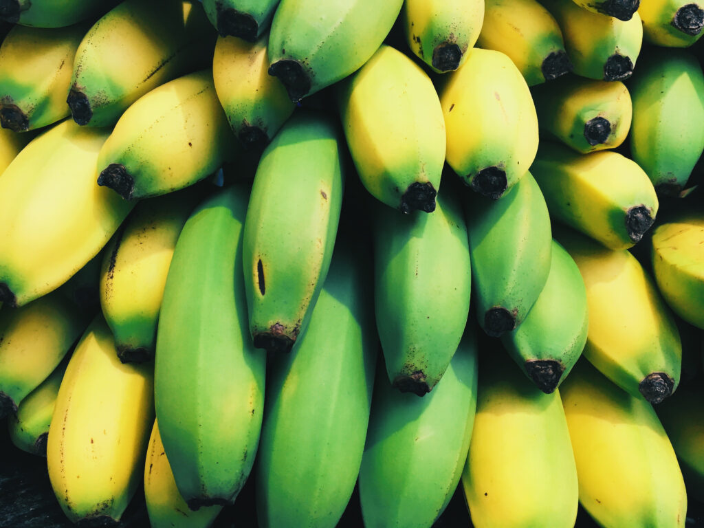 Vibrant Banana Wallpaper: Ripe Yellow & Fresh Green Close-Up