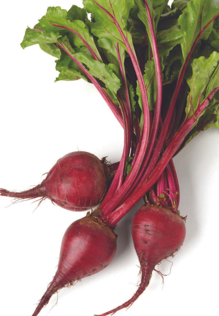 Fresh Beetroot Wallpaper: Vibrant Red-Purple Roots & Green Leaves