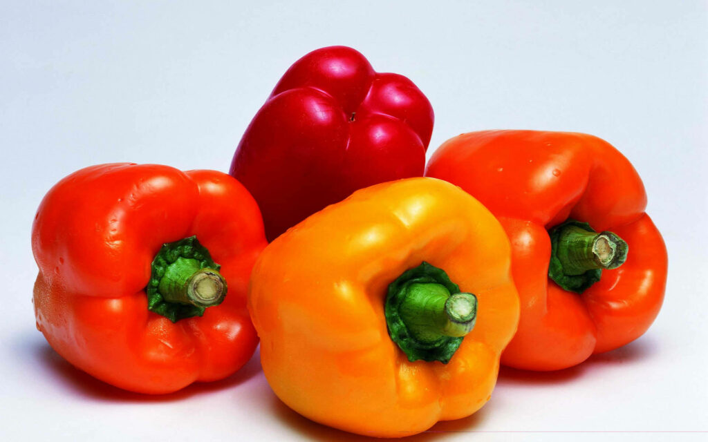 Vibrant Multi-Colored Bell Peppers Wallpaper Background