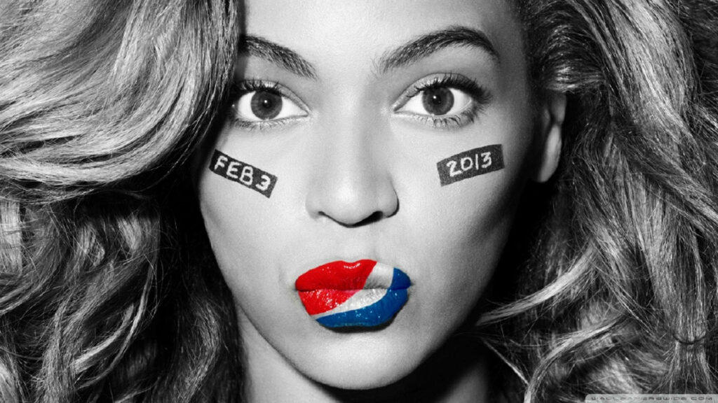 Vibrant Beyonce Wallpaper: Bold Pepsi-Inspired Face Paint Art