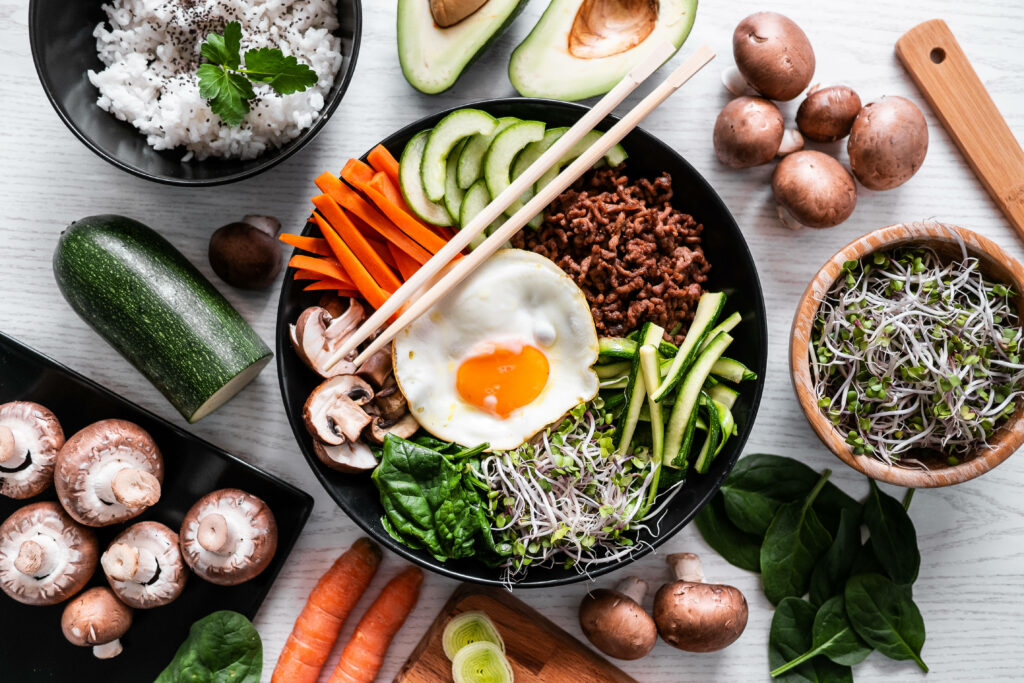 Vibrant Bibimbap Wallpaper: Fresh Ingredients & Colorful Bowl Design