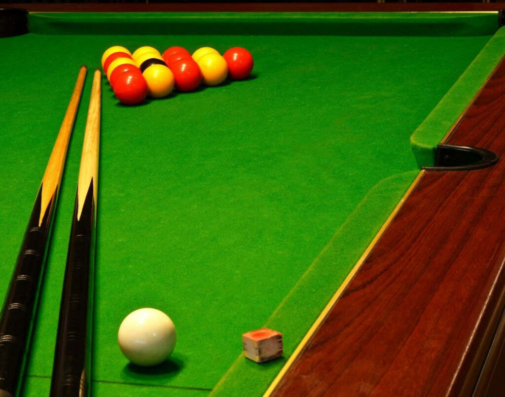 Vibrant Billiards Wallpaper: Green Pool Table & Classic Setup