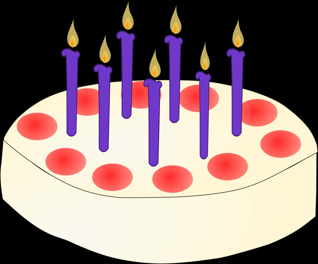 Vibrant Birthday Cake Wallpaper with Purple Candles & Cheerful Toppings