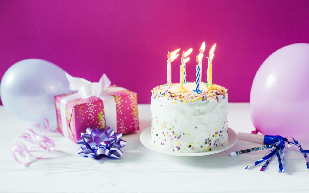 Festive Birthday Wallpaper: Cake, Balloons & Gift on Bright Background