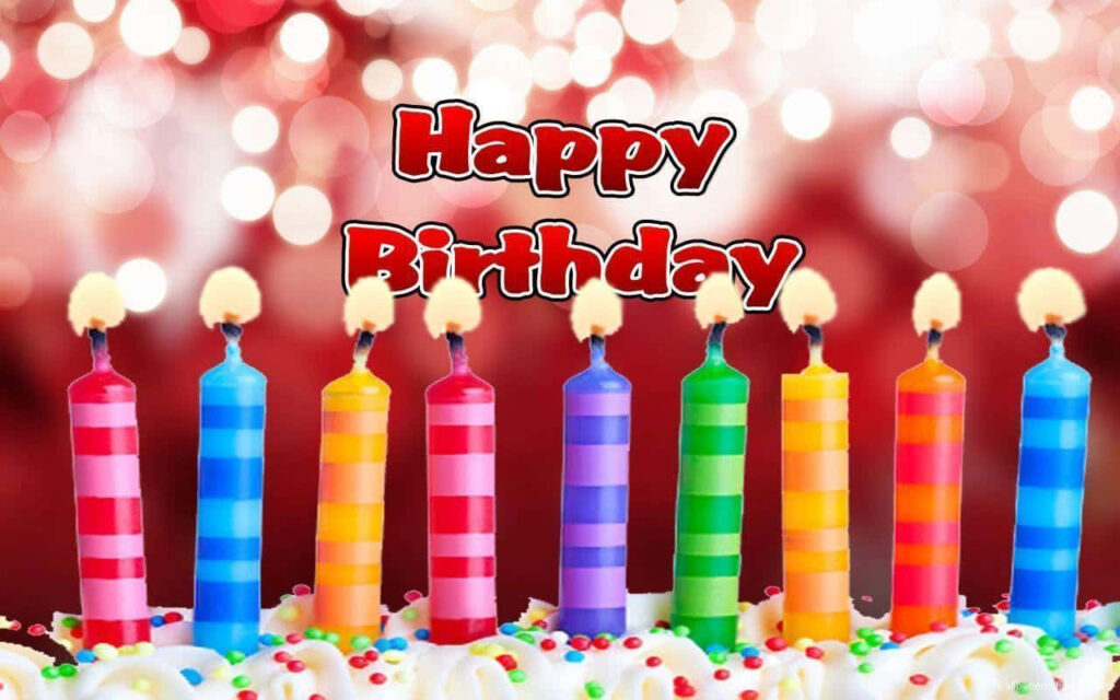 Colorful Birthday Cake Wallpaper with Candles & Bokeh Background