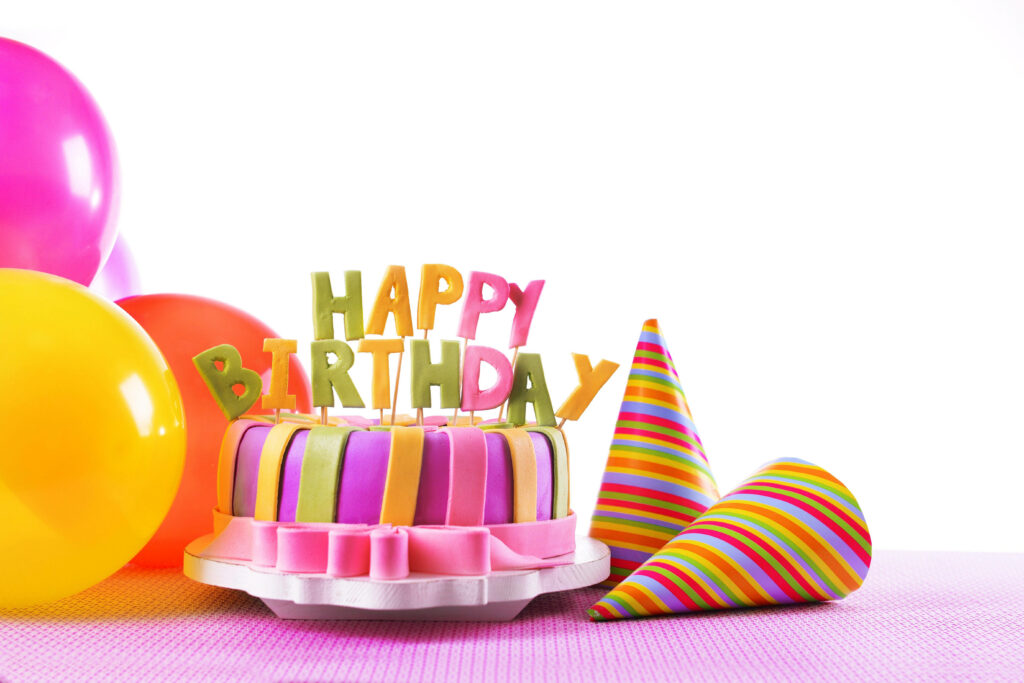 Cheerful Birthday Wallpaper with Colorful Cake & Festive Balloons
