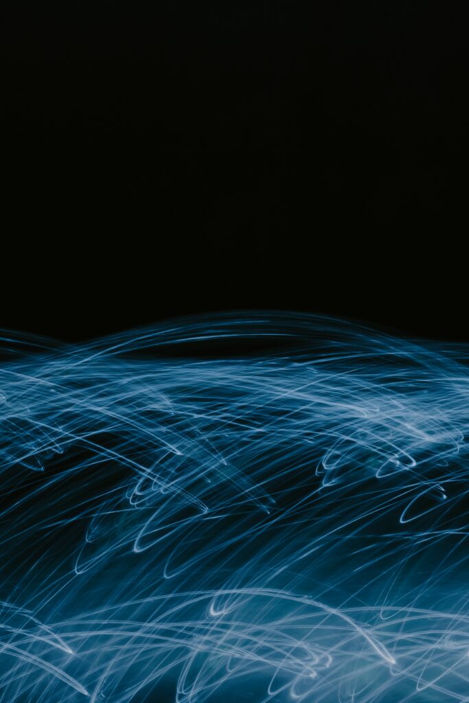 Captivating Abstract Blue Wallpaper: Vibrant Light Motion Design