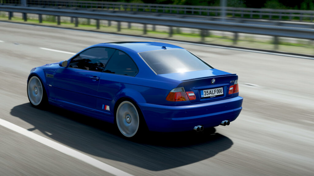 Vibrant blue BMW racing on highway with sleek design motion blur Forza 4 wallpaper background
