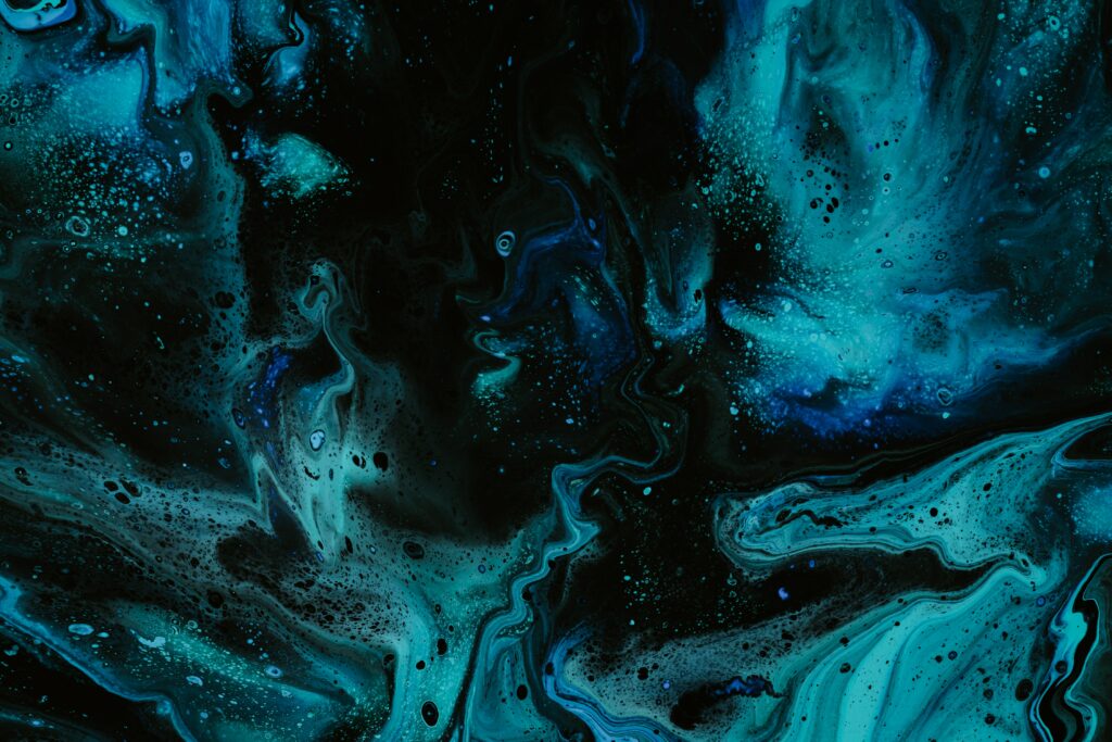 Vibrant Abstract Fluid Art Wallpaper in Blue and Black Background
