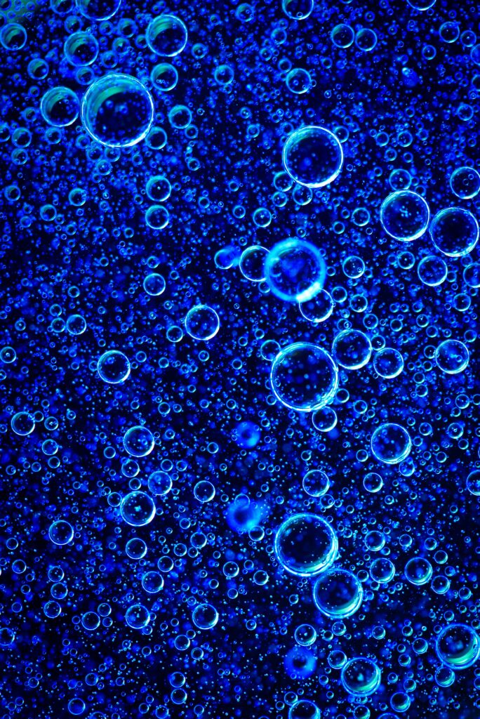 Vibrant Blue Bubble Wallpaper - Mesmerizing Abstract Design