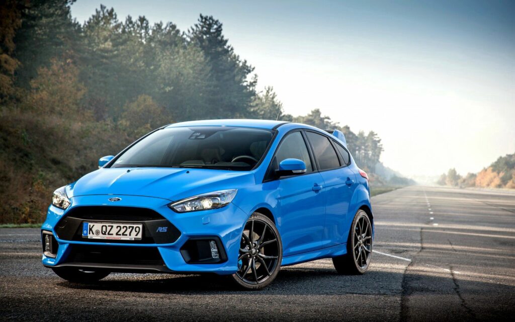 Dynamic Blue Ford Focus RS Wallpaper - Sporty Design & Scenic Road
