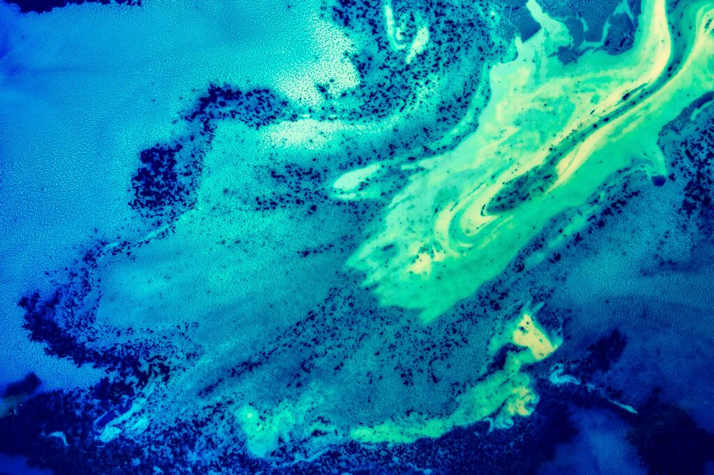 Abstract Blue and Green Wallpaper: A Dynamic Artistic Background