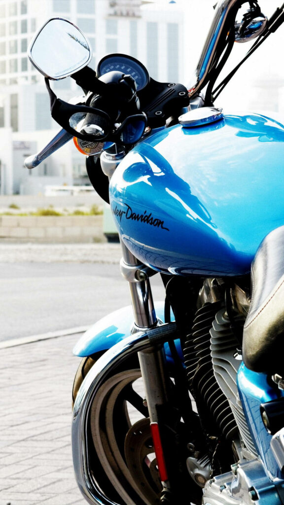 Vibrant Blue Harley Davidson Wallpaper: Sleek Urban Background