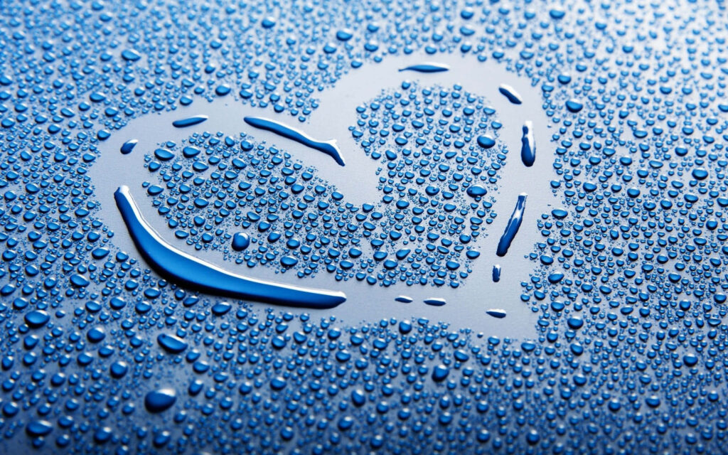 Refreshing Blue Heart Wallpaper with Water Droplets