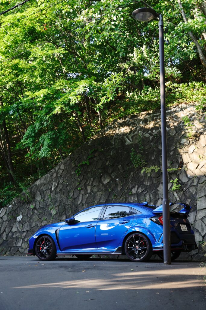 Stunning Blue Honda Civic Type-R in Scenic Greenery Background Wallpaper