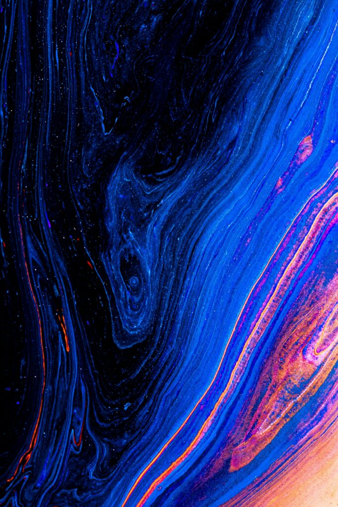 Vibrant Abstract Wallpaper: Swirling Blue & Orange Paint Stains