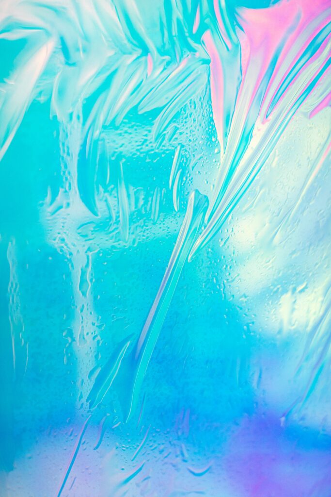 Vibrant Blue and Pink Abstract Wallpaper with Fluid Marbled Design