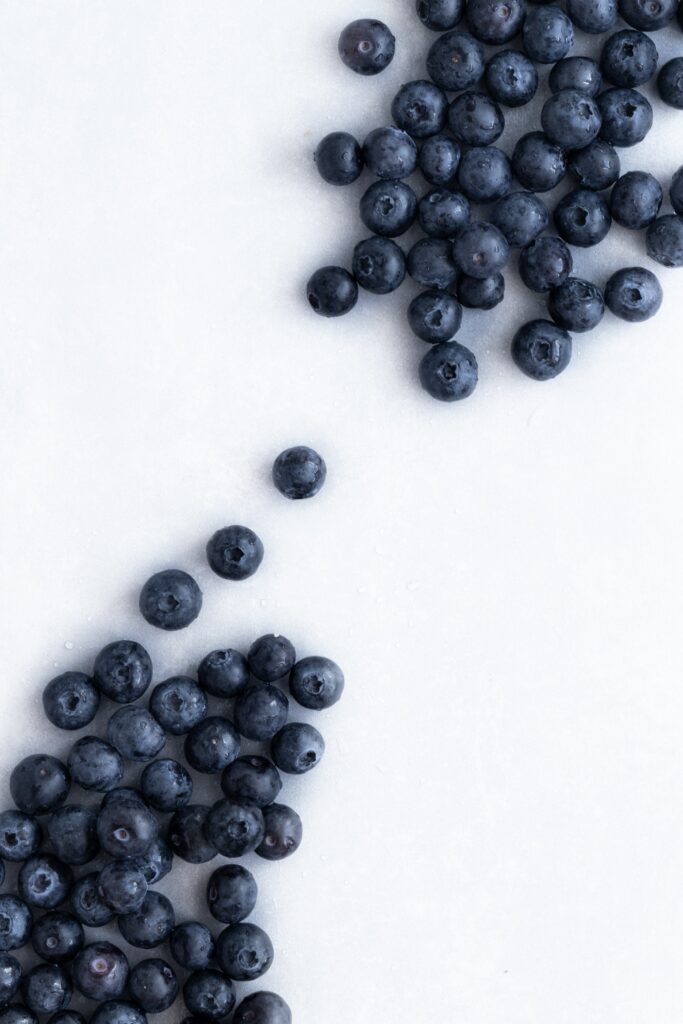 Vibrant Blueberries Wallpaper: Refreshing Nature Background