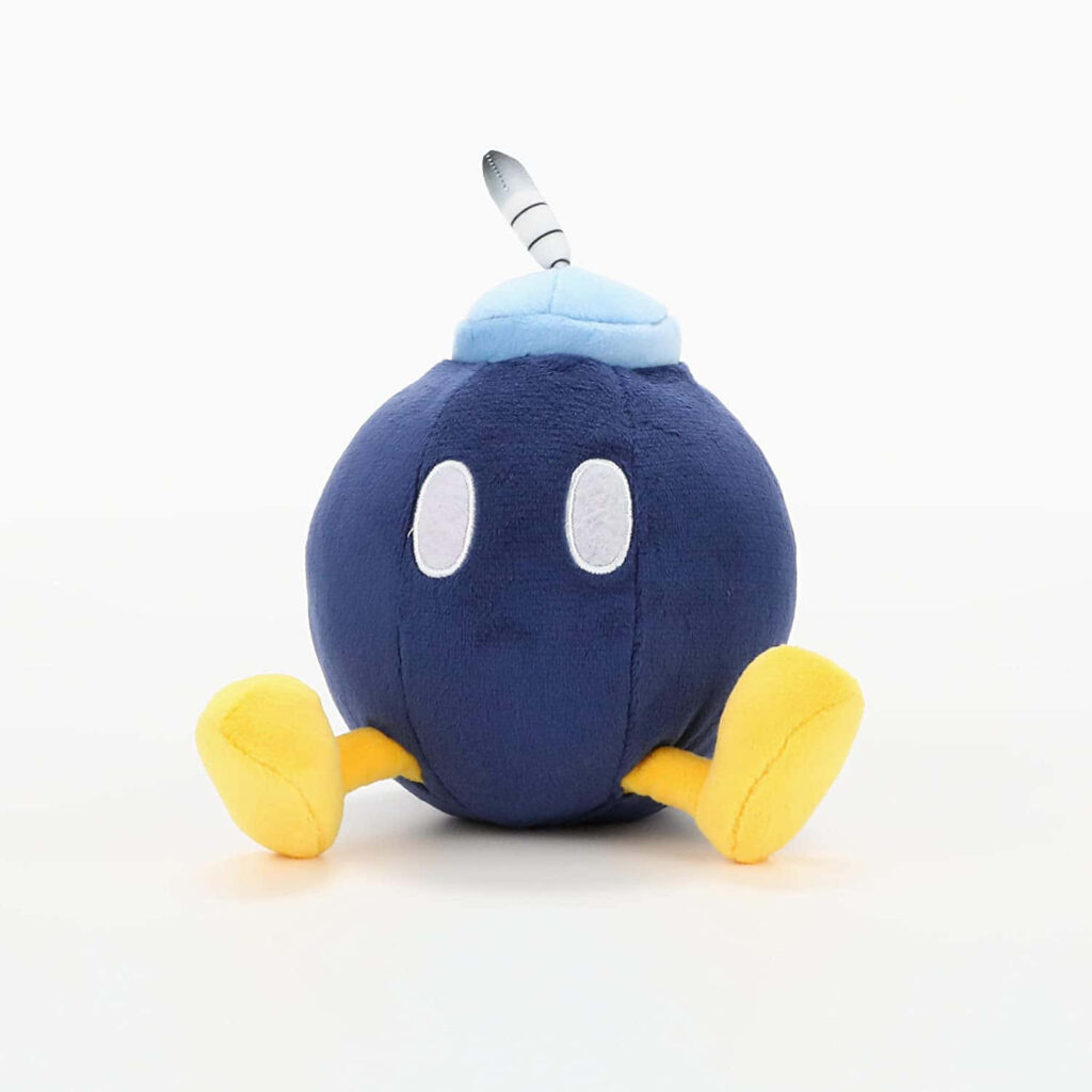 Vibrant Bob-omb wallpaper with blue body yellow feet fiery dynamic background explosive energy