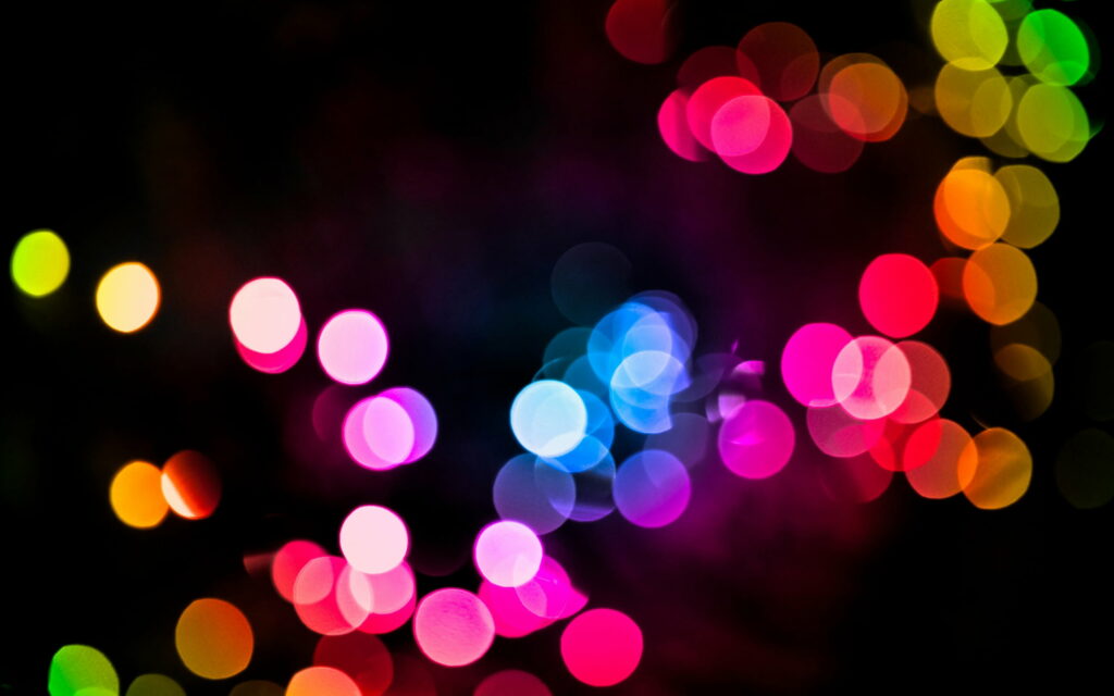 Blurred Magic: A Vibrant Display of Bokeh Colorful Lights Wallpaper