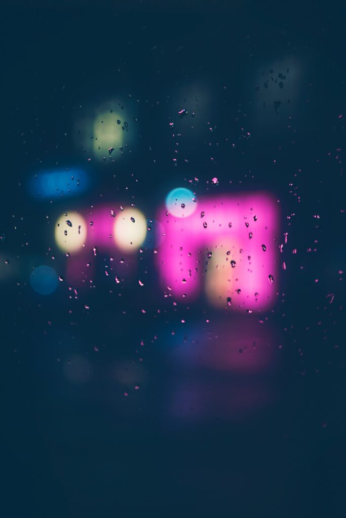 Vibrant Bokeh Water Droplets on Glass - Soft Focus Wallpaper Background