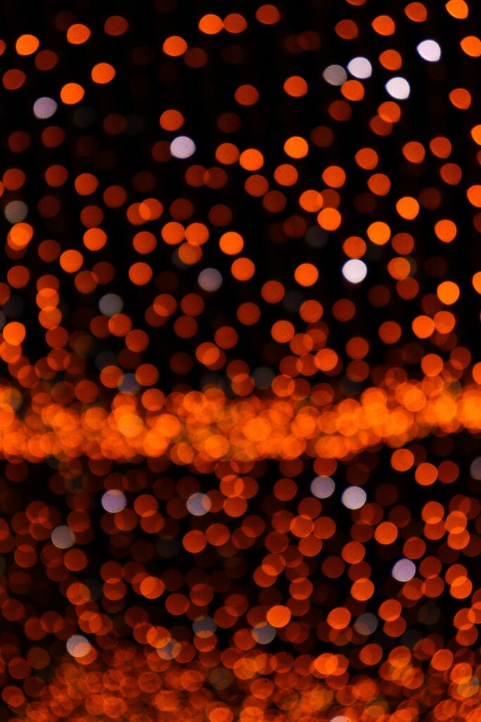 Stunning Bokeh Wallpaper: Orange & White Lights on Dark Background