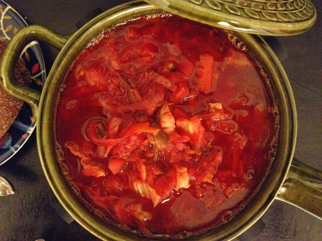 Vibrant Borscht Wallpaper: Hearty Soup in Rustic Ceramic Bowl