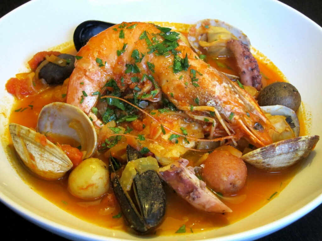 Colorful Bouillabaisse Wallpaper: Seafood Delight in Rich Sauce
