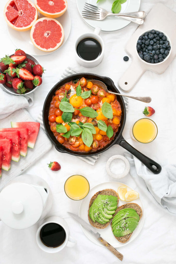 Vibrant Breakfast Spread with Skillet Cherry Tomatoes & Avocado Toast Wallpaper