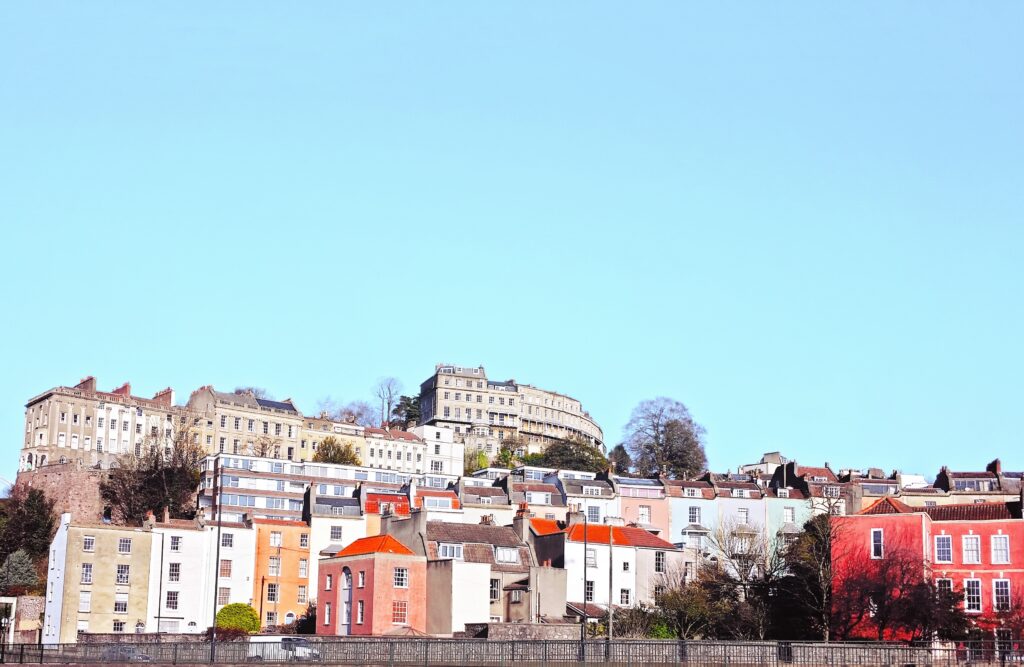 Vibrant Bristol Wallpaper: Colorful Buildings & Clear Blue Sky