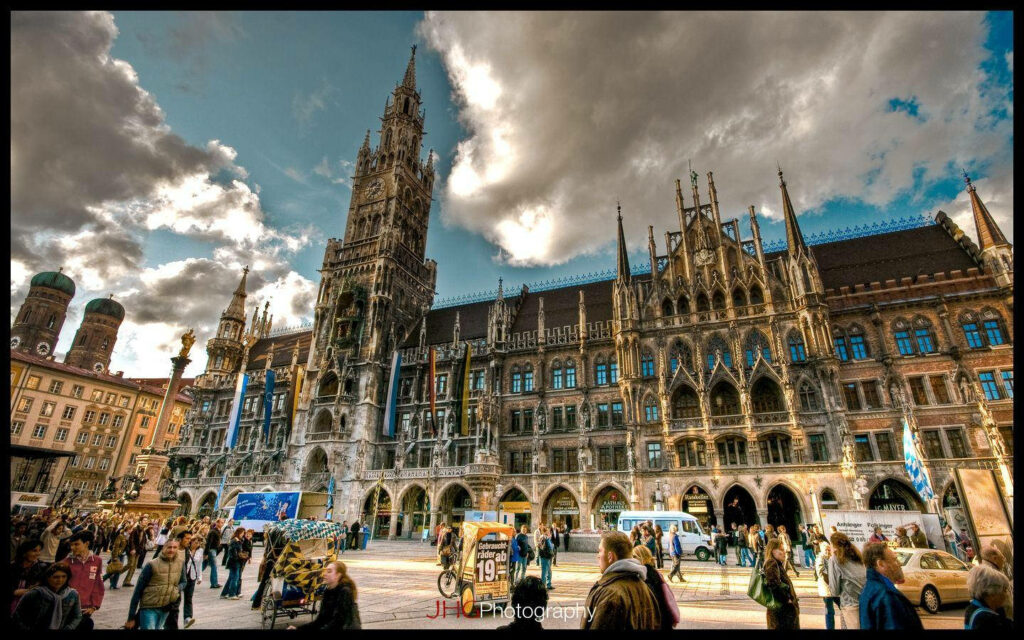 Vibrant Brussels Wallpaper: Gothic Architecture & Lively Square Scene