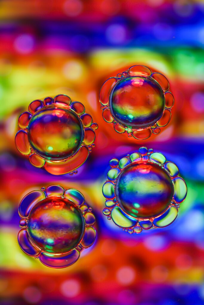 Vibrant Macro Bubble Wallpaper with Multicolored Background